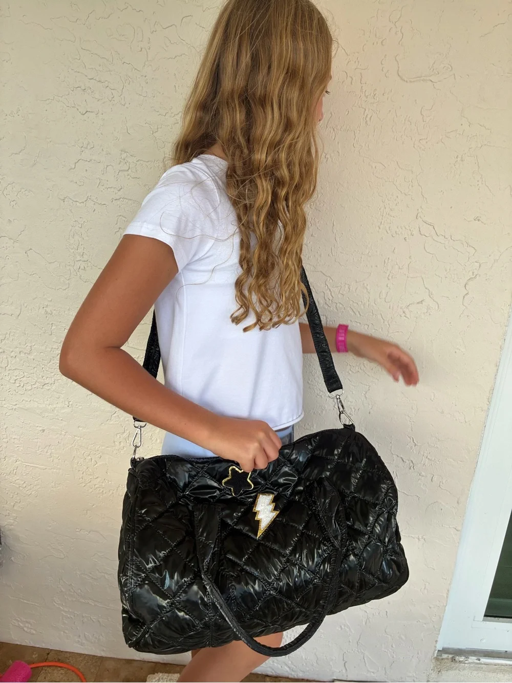 Black Quilted Duffel Bag with Smiley Patch
